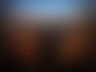 Mavi gökyüzünün bulanık arkaplanı ve biraz da portakal.