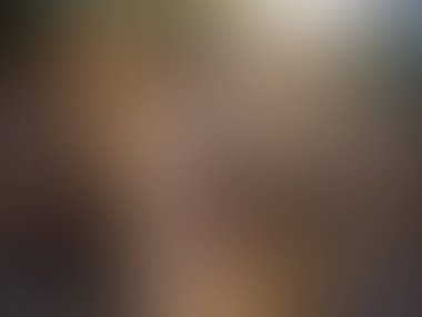 Cep telefonu tutan kişinin bulanık arkaplanı