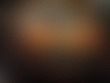 Cep telefonu tutan kişinin bulanık arkaplanı