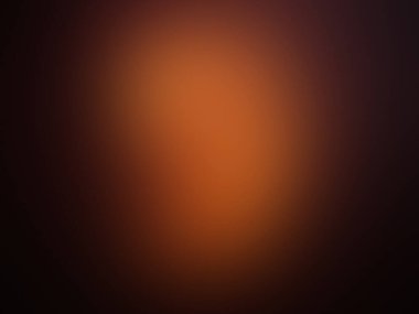 Siyah arkaplanı olan bulanık turuncu bir arkaplan