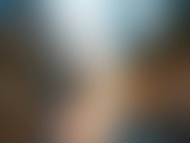 Mavi ve kahverengi bir gökyüzünün bulanık arkaplanı