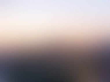 Mavi ve pembe bir gökyüzünün bulanık arkaplanı