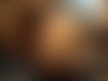 Cep telefonu tutan bir kişinin bulanık görüntüsü