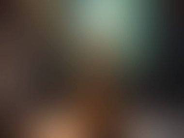 Cep telefonu tutan kişinin bulanık arkaplanı