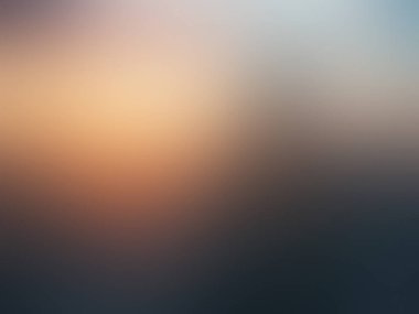 Tek bir ışıkla gün batımının bulanık arkaplanı