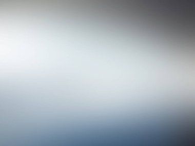 Bulanık bir arka planı olan, gökyüzünde uçan bir uçak.