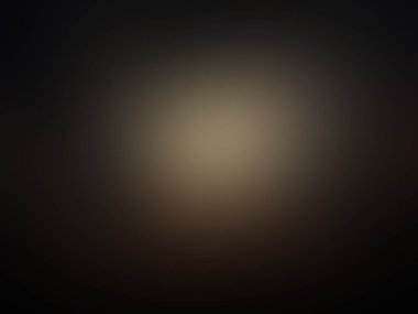 Ortasında ışık olan koyu bir arkaplan.