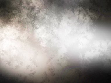 Takım elbiseli ve kravatlı bir adam duvarın önünde duruyor.