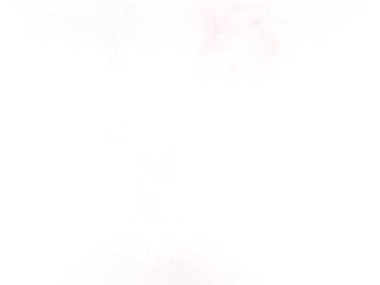 Beyaz bir duvarın önünde duran takım elbiseli ve kravatlı bir adam.