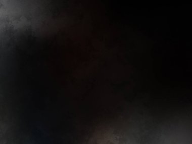 Takım elbiseli birinin siyah beyaz fotoğrafı.