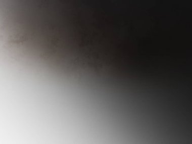 Takım elbiseli ve kravatlı bir adam pencerenin önünde duruyor.