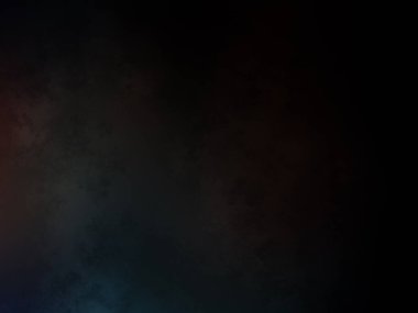 Takım elbiseli ve kravatlı bir adam karanlık bir arka planın önünde duruyor.