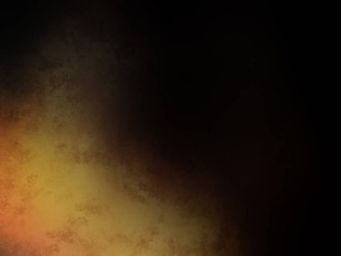 Elinde cep telefonu olan takım elbiseli ve kravatlı bir adam.