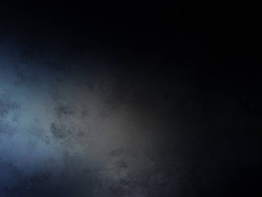 Koyu mavi bir arkaplan ve yukarıdan gelen bir ışık.