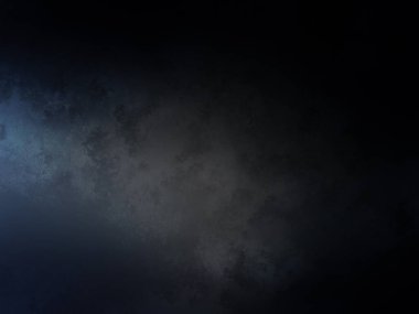 Koyu mavi bir arkaplan ve yukarıdan gelen bir ışık.