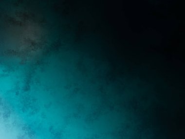 Dalgıç kıyafetli bir adam elinde sörf tahtası tutuyor.