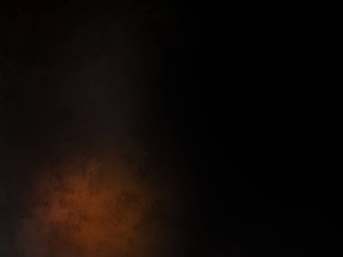 Takım elbiseli ve kravatlı bir adam ateşin önünde duruyor.