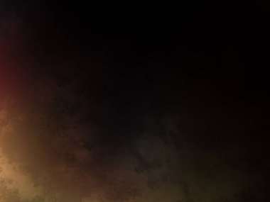 Karanlık bir yüzeyde kaykay süren bir insan.