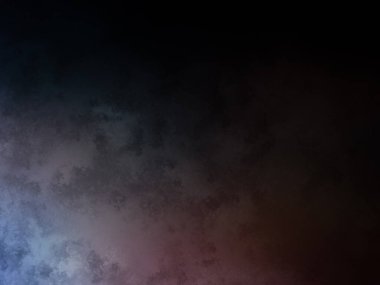 Koyu ve renkli bir arka plan, kırmızı ve mavi bir ışık.