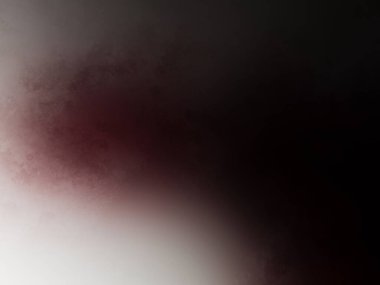 Bulanık arkaplanı olan kırmızı ve beyaz bir nesne