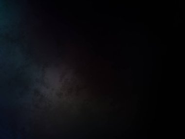 koyu bir arkaplan ve mavi ve yeşil ışık