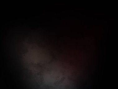 Tepesinden kırmızı ışık çıkan siyah bir arkaplan.