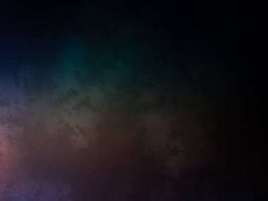 koyu bir arkaplan ve renkli bir ışık