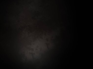 Ortasında beyaz ışık olan siyah bir arkaplan.