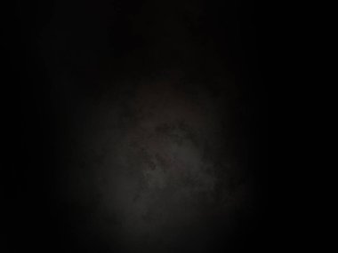 Ortasında beyaz ışık olan siyah bir arkaplan.