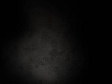 Ortada beyaz nokta olan siyah bir arkaplan.