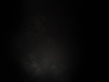 Ortasında beyaz ışık olan siyah bir arkaplan.