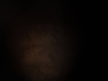 Siyah bir arkaplan ve koyu bir ışık