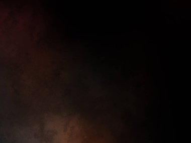 Takım elbiseli ve kravatlı bir adam ateşin önünde duruyor.