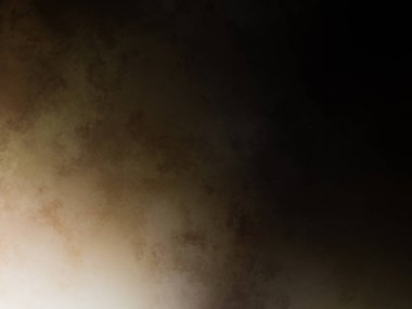 Elinde cep telefonu olan takım elbiseli ve kravatlı bir adam.