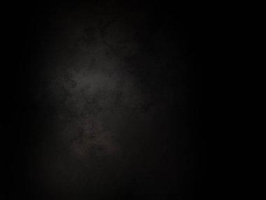 Ortasında beyaz ışık olan siyah bir arkaplan.