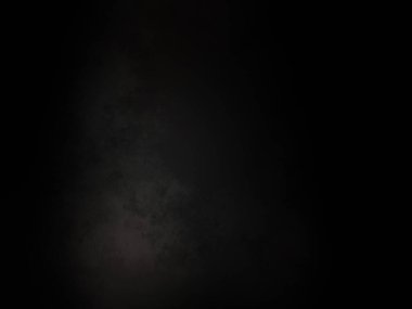 Ortasında beyaz ışık olan siyah bir arkaplan.