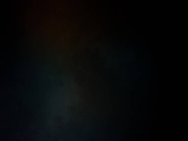 Bir ışığın bulanık görüntüsüne sahip siyah bir arkaplan