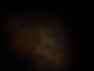 Ortasında ışık olan koyu bir arkaplan.