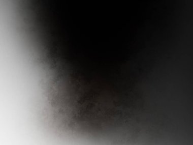 Dizüstü bilgisayarla yatakta oturan biri.