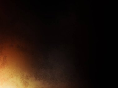 Takım elbiseli ve kravatlı bir adam ateşin önünde duruyor.