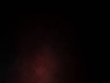 Karanlık gökyüzünde parlayan kırmızı bir ışık.