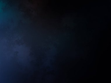 Takım elbiseli ve kravatlı bir adam karanlık bir arka planın önünde duruyor.