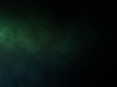 Siyah gömlekli bir adam tenis raketi tutuyor.