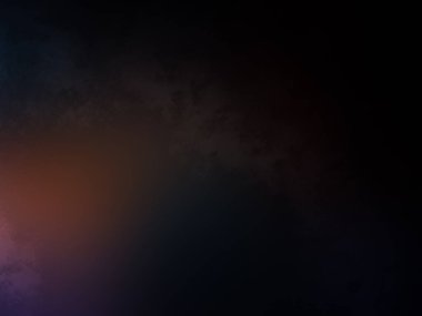 koyu bir arkaplan ve renkli bir ışık