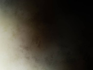 Elinde cep telefonu olan takım elbiseli ve kravatlı bir adam.