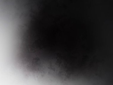 Siyah beyaz bir fotoğraftaki kişi.