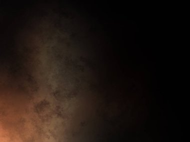 Takım elbiseli ve kravatlı bir adam ateşin önünde duruyor.