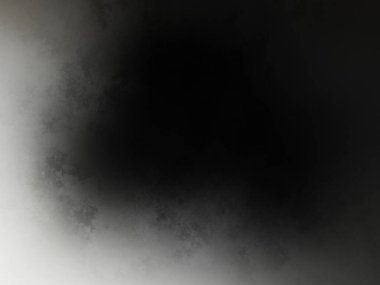 Takım elbiseli birinin siyah beyaz fotoğrafı.