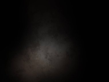 Tepesinden siyah bir ışık geçen siyah bir arkaplan