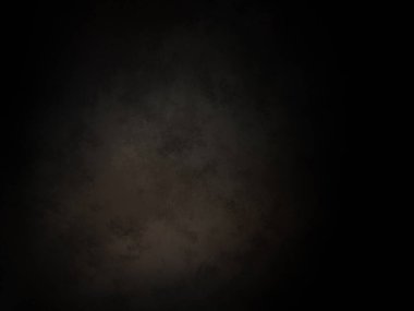 Ortada siyah bir nokta olan siyah bir arkaplan.